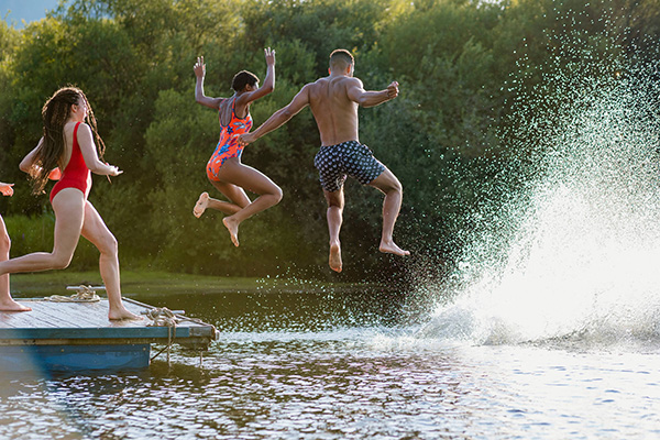 A roped-off swimming area at a lake beach near Kansas City
