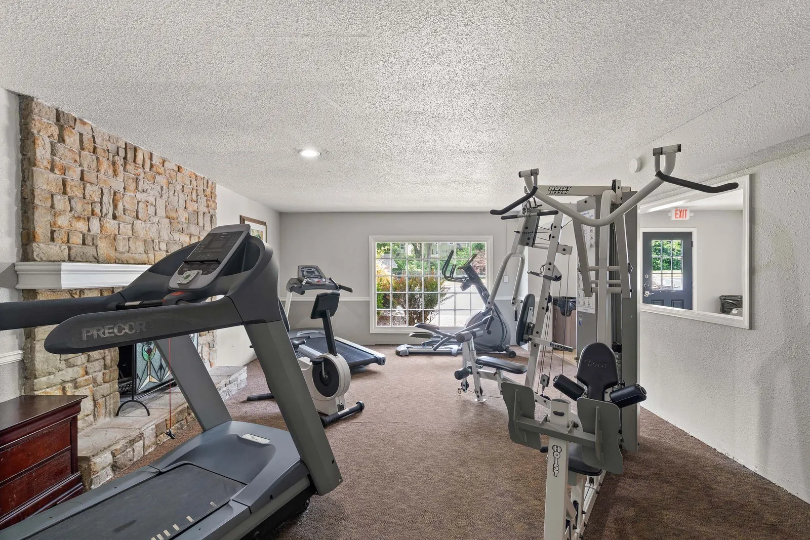 Forest Park Apartments - a fitness center with equipment