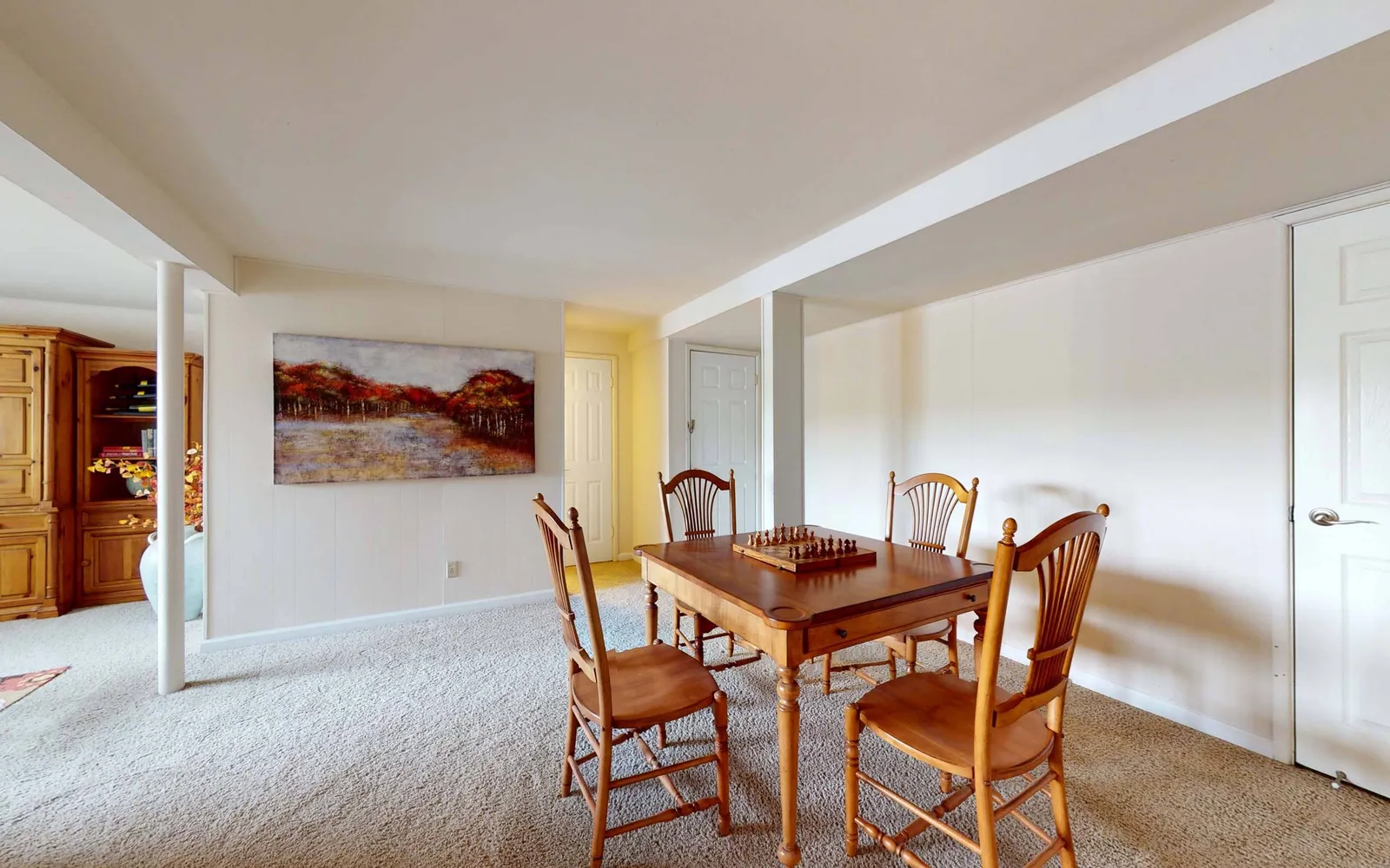 Grant 79 Apartment Homes - a dining area with a table and chairs