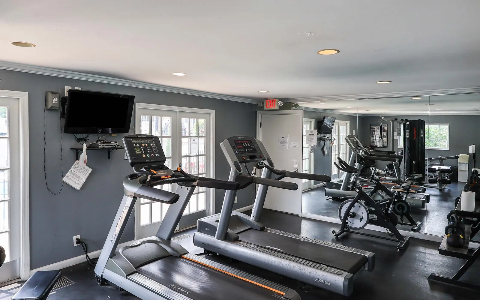 Grant 79 Apartment Homes - a fitness center with equipment