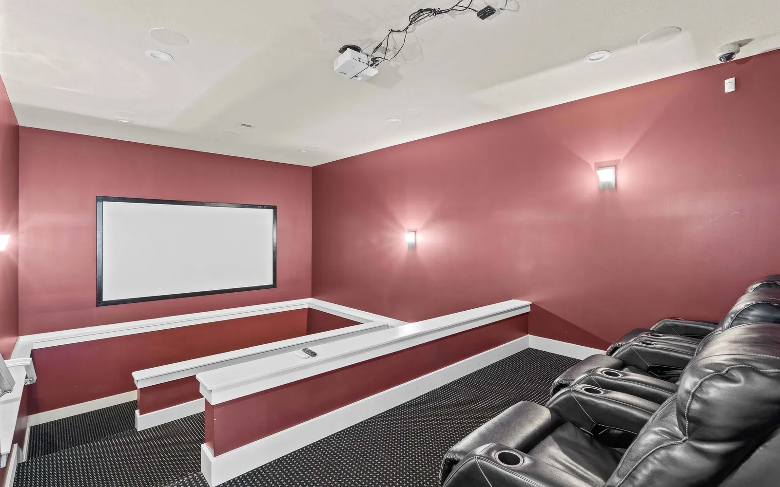 The Hills Apartments - a red and white movie theatre