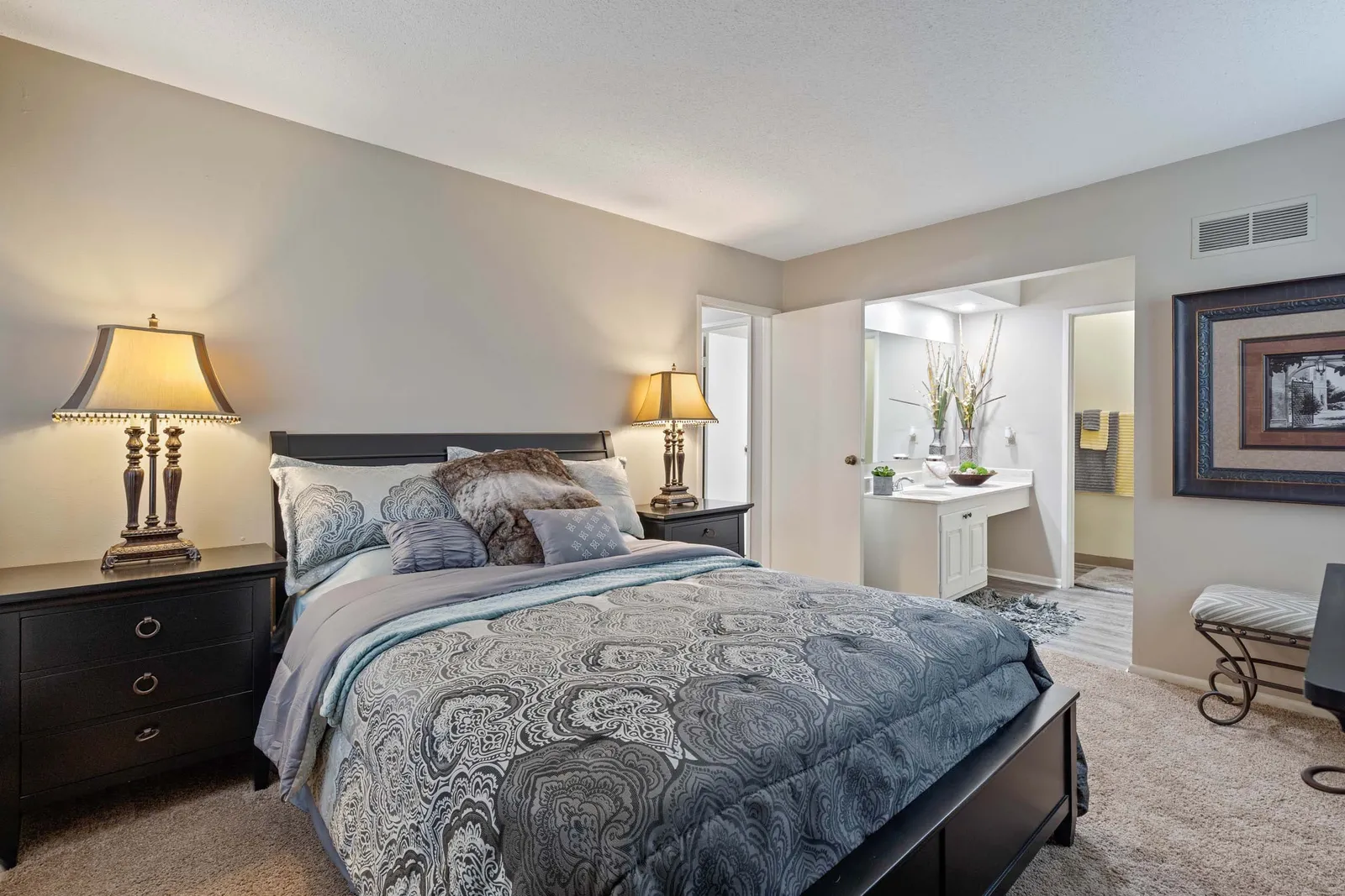 The Oaks at Prairie View - a bedroom with a connected bathroom
