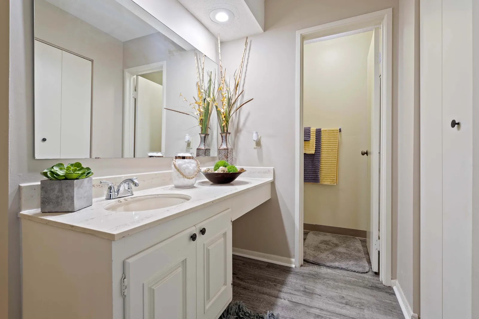 The Oaks at Prairie View - a bathroom with a long countertop