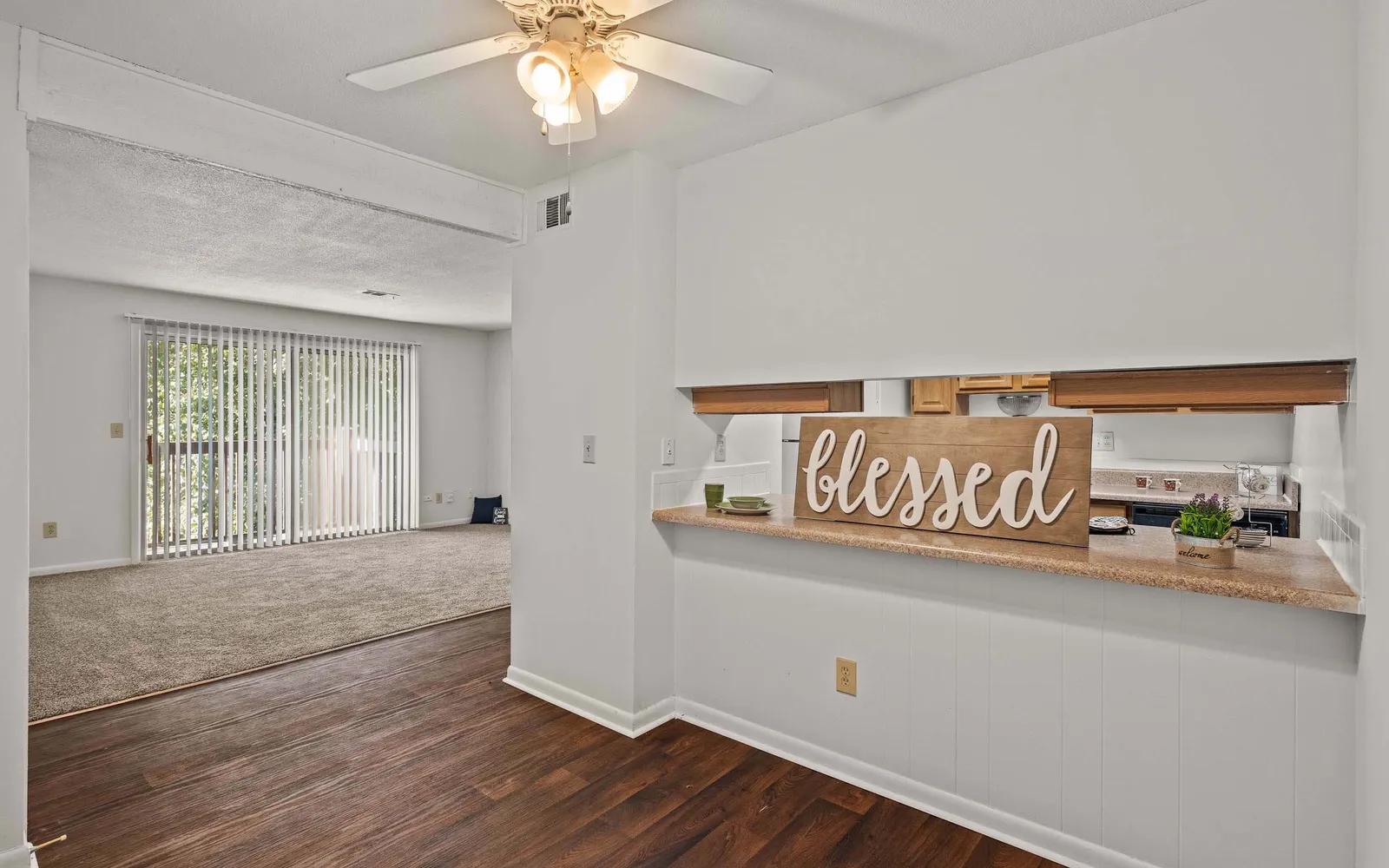 The Retreat at Mill Creek - a dining nook with a sign that reads blessed