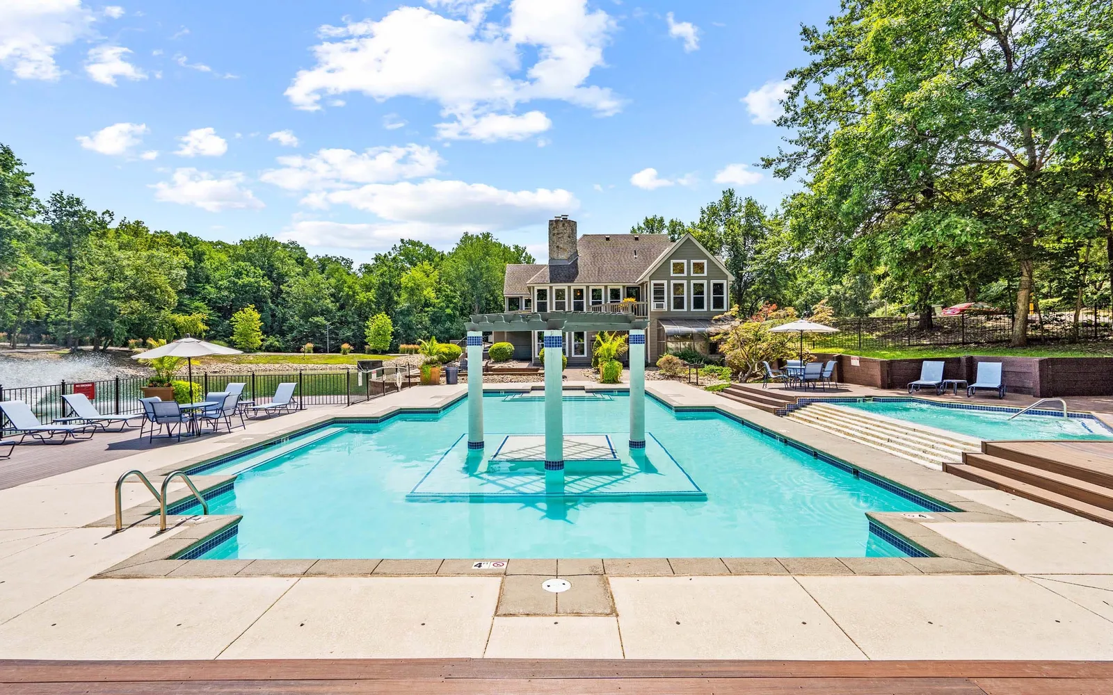 The Retreat at Walnut Creek - a swimming pool surrounded by trees