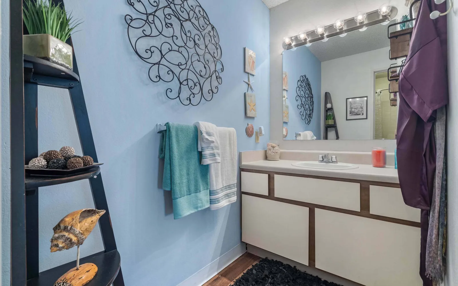The Retreat at Woodridge - a bathroom with a ladder decor and towers